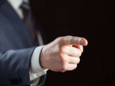 Businessman pointing forward