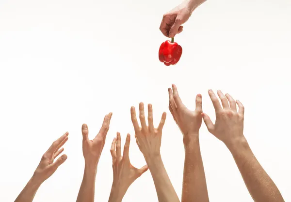 Many hands want to get pepper — Stock Photo, Image