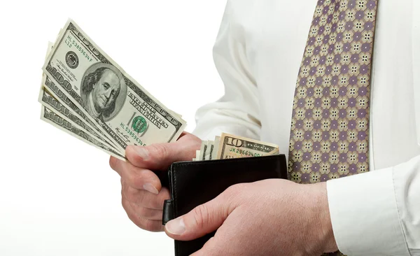 Man's hands holding dollars in leather wallet — Stock Photo, Image