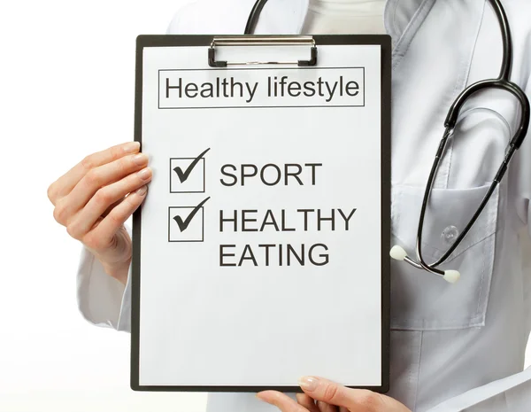 Doctor prescribing healthy lifestyle — Stock Photo, Image