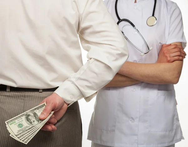 Patient paying medical service — Stock Photo, Image