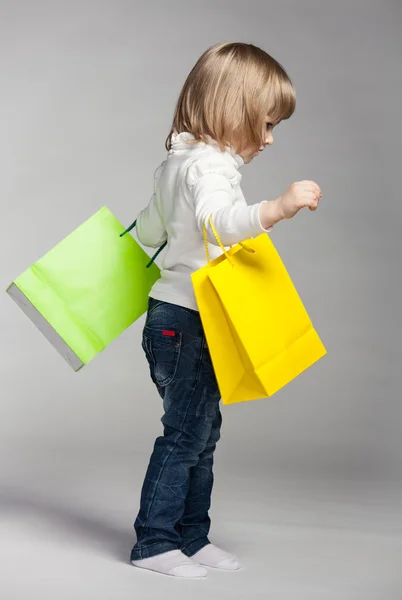 Girl with two shopping bags — Stock Photo, Image