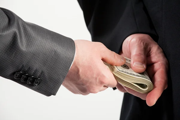 Giving a bribe — Stock Photo, Image