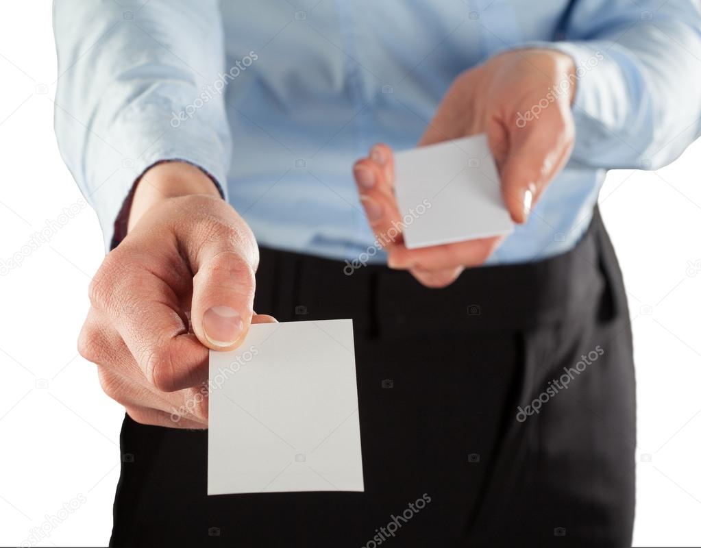 Businesswoman giving business card to you