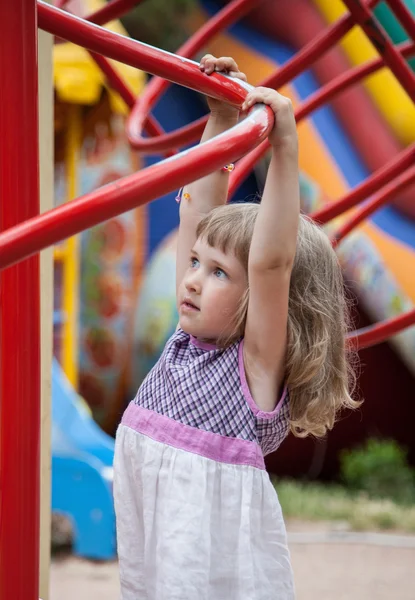 Active little girl playing in a stadium — Stock Photo, Image