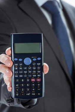 tatlı bir işadamı ile hesap makinası