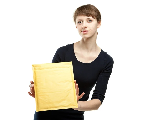 Young woman showing letter in envelope — Stock Photo, Image