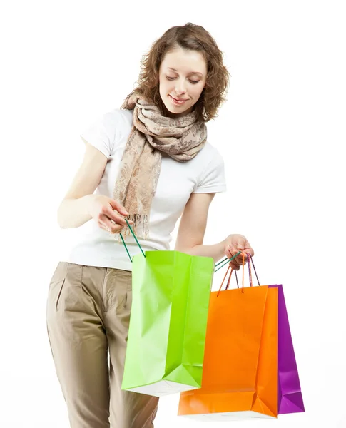 Mujer joven sosteniendo bolsas de papel de compras —  Fotos de Stock