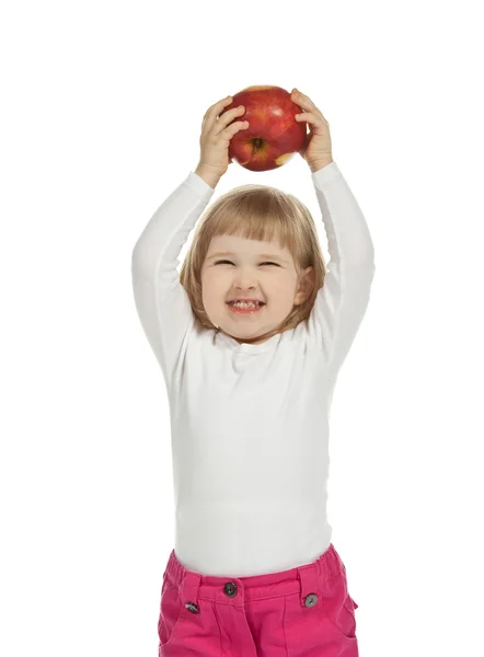 Uma menina com uma maçã — Fotografia de Stock