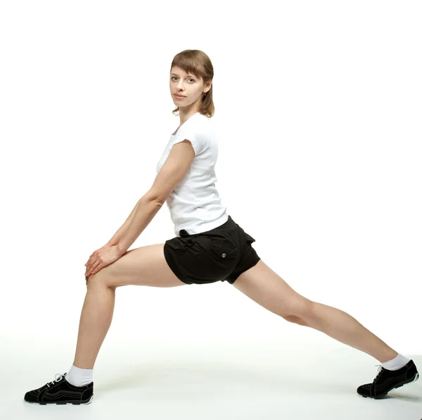 Young woman doing sport exercises — Stock Photo, Image