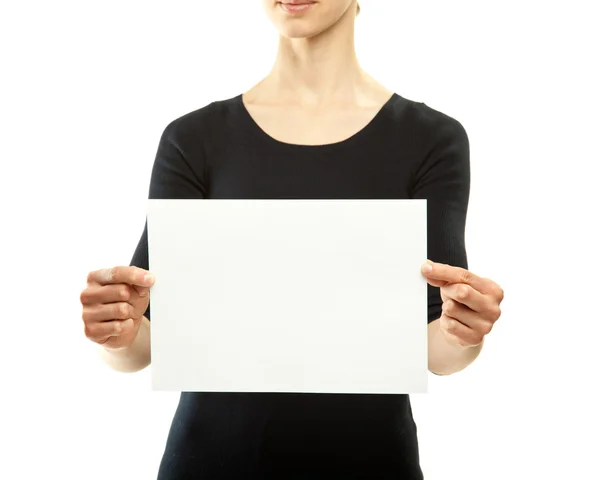 Les mains de la femme tenant une feuille de papier vierge — Photo