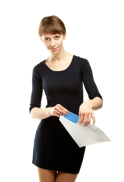 Attractive young woman holding envelope or letter — Stock Photo, Image