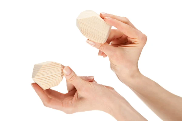 Hands showing two wooden blocks — Stock Photo, Image