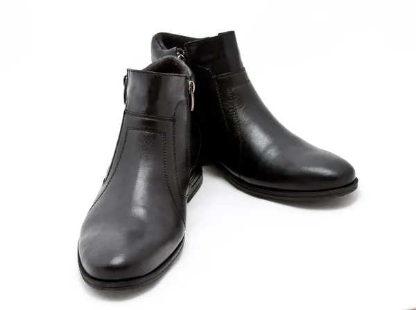 Paar zwarte laarzen — Stockfoto