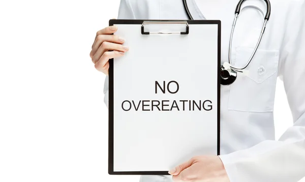 Doctor forbidding overeating — Stock Photo, Image