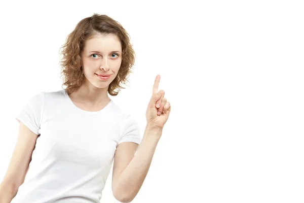 Young woman pointing at something, copyspace — Stock Photo, Image