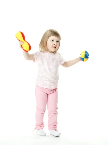 Cute little baby girl doing sport exercises with toy dumbbells — Stock Photo, Image