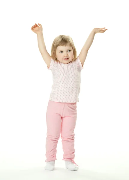 Adorable baby girl doing gymnastics — Stock Photo, Image