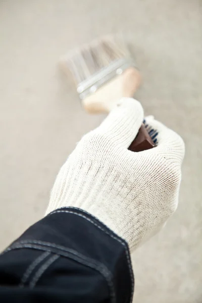 Hand i handsken måleri vägg — Stockfoto