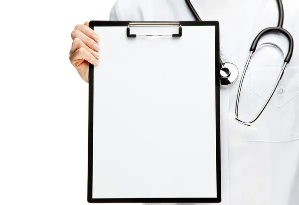 Doctor's hands holding clipboard with blank sheet of paper Royalty Free Stock Photos