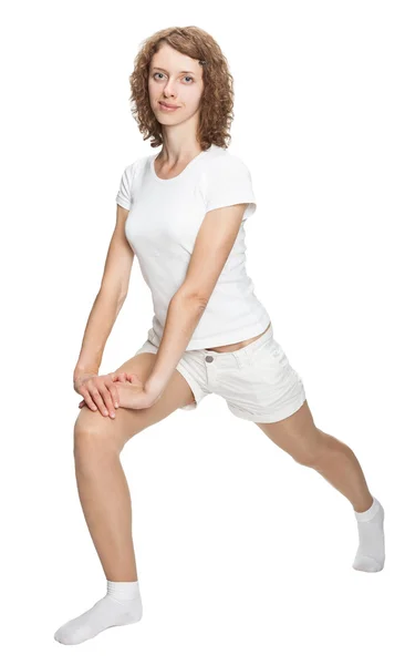 Attractive young woman doing sport exercises — Stock Photo, Image