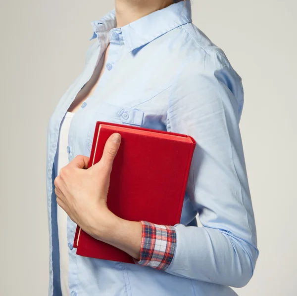 Student holding a book — Stock Photo, Image