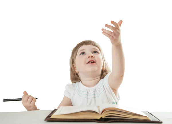 Lachende meisje houdt een pen en opzoeken — Stockfoto