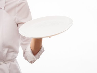 Cook'un el beyaz plaka tutarak