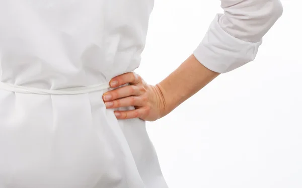 Female cook holding hand on waist — Stock Photo, Image