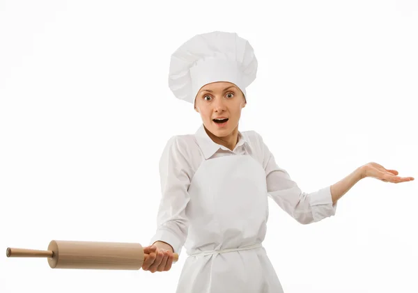 Surprised woman cook holding a rolling pin — Stock Photo, Image