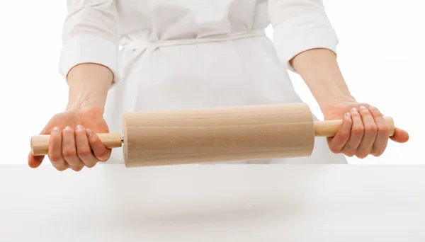 Mulher chef segurando rolo pin — Fotografia de Stock