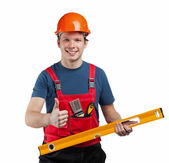 Cheerful construction worker in uniform