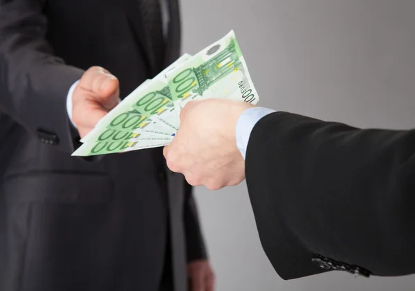 Businessman accepting money offer — Stock Photo, Image