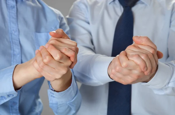 Business people showing supportive sign — Stock Photo, Image