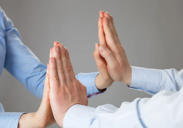 Hands of business people giving high fives — Stock Photo, Image