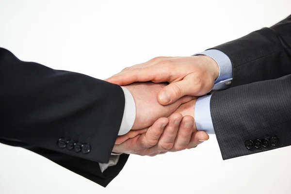Empresários apertando as mãos — Fotografia de Stock