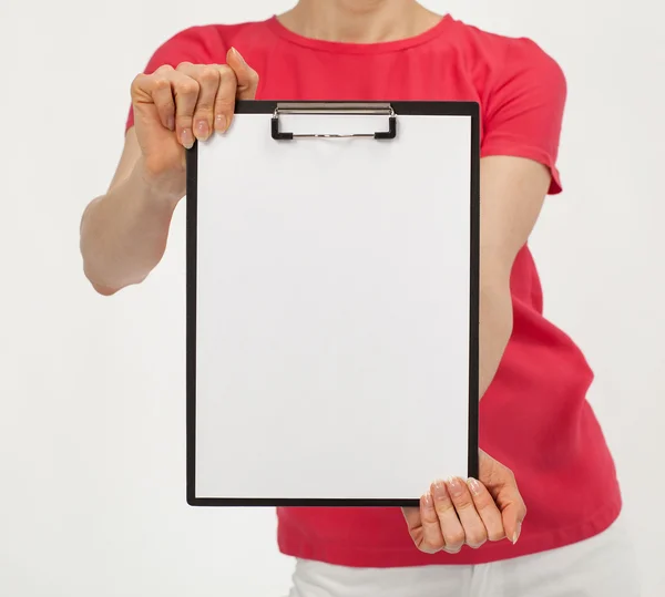 Unrecognizable woman showing clipboard — Stock Photo, Image