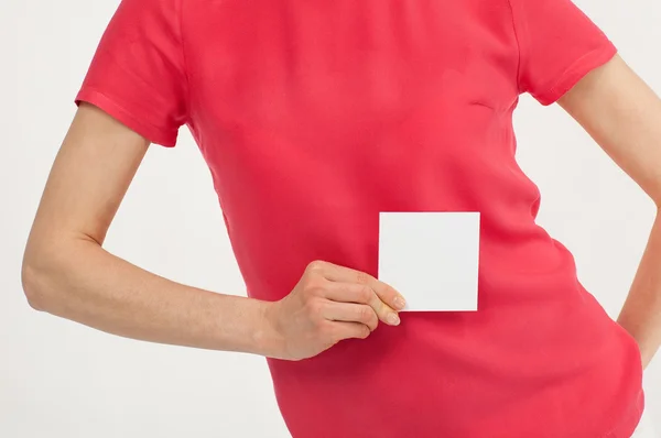 Woman's hand holding blank white sticker — Stock Photo, Image