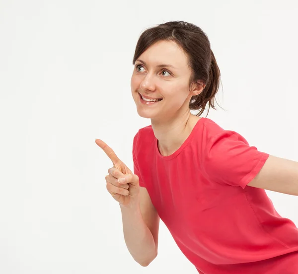 Attractive young woman pointing up — Stock Photo, Image