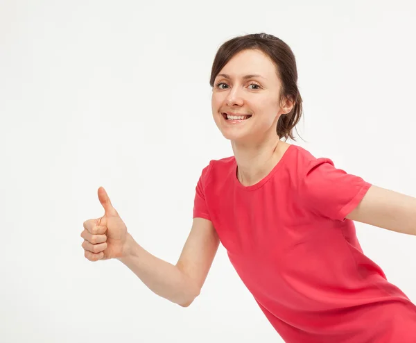 Příležitostné usměvavá mladá žena ukazuje palec nahoru znamení — Stock fotografie