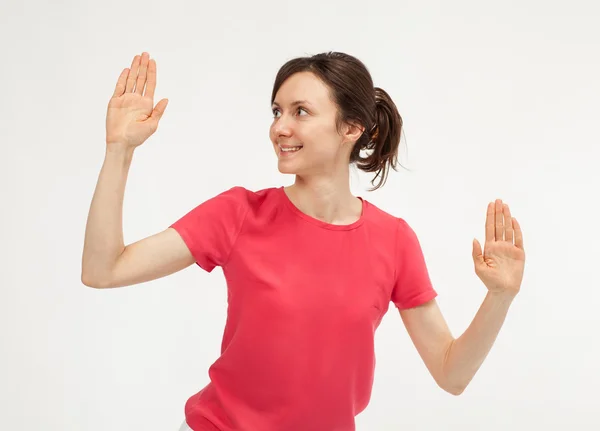 Attractive young woman showing palms — Stock Photo, Image