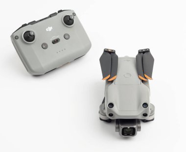 ISTANBUL, TURKEY - JANUARY 6, 2022: DJI Air 2S Drone with remote controller on white background.