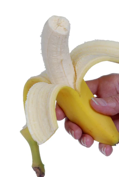 Χέρι που κρατά μια φρέσκια μπανάνα — Φωτογραφία Αρχείου