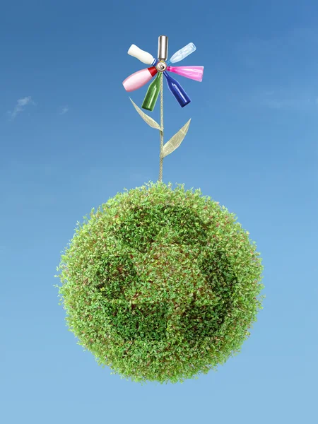 Эко-цветок на зеленой планете переработки — стоковое фото