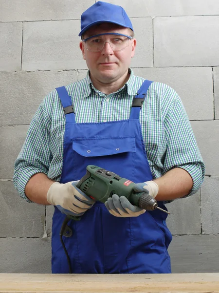 Trabajador con máquina de perforación — Foto de Stock