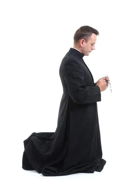 Priest with rosary — Stock Photo, Image