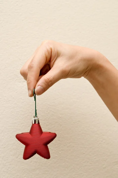 Holding object on Christmas day — Stock Photo, Image