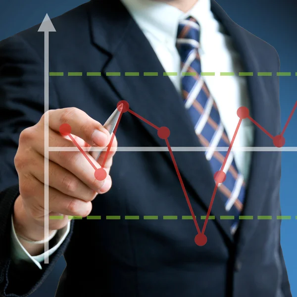 Business man writing graph — Stock Photo, Image