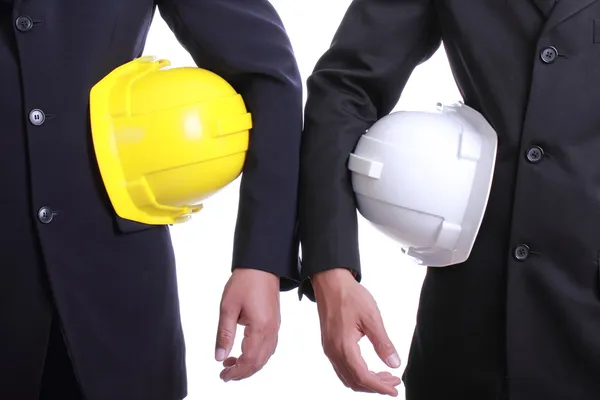 Two Engineer people holding safety hat — Stock Photo, Image