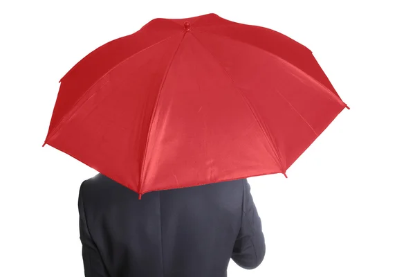 Empresario sosteniendo paraguas rojo — Foto de Stock